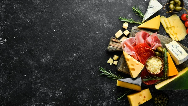 Italian Appetizers Cheese Wine Salami Prosciutto Black Stone Background Top — Stock Photo, Image