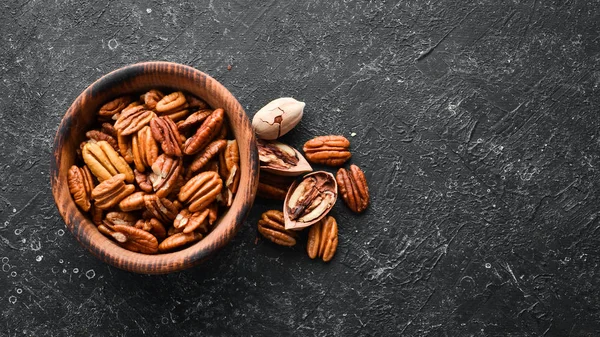 Kavanozda fındık. Sağlıklı beslenme. Üst Manzara. Metnin için boş yer.