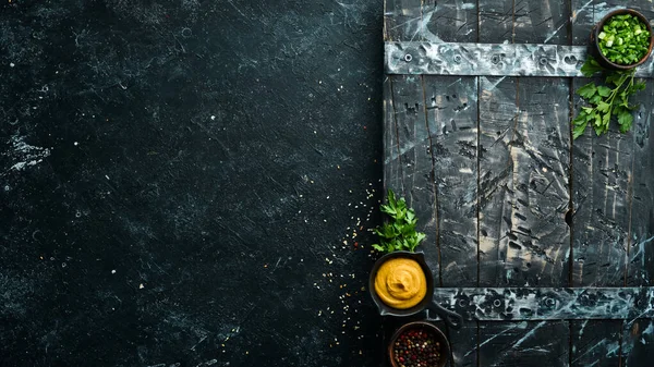 Black stone banner of food, vegetables and spices. Background of cooking.