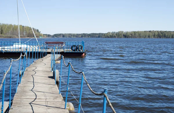 Part of the floating bridge on the background of water — Stock Photo, Image