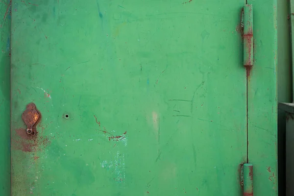 Old green painted door.Place for text.
