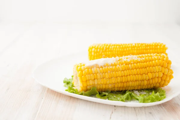 The cob of boiled corn on a white background. — Stock Photo, Image