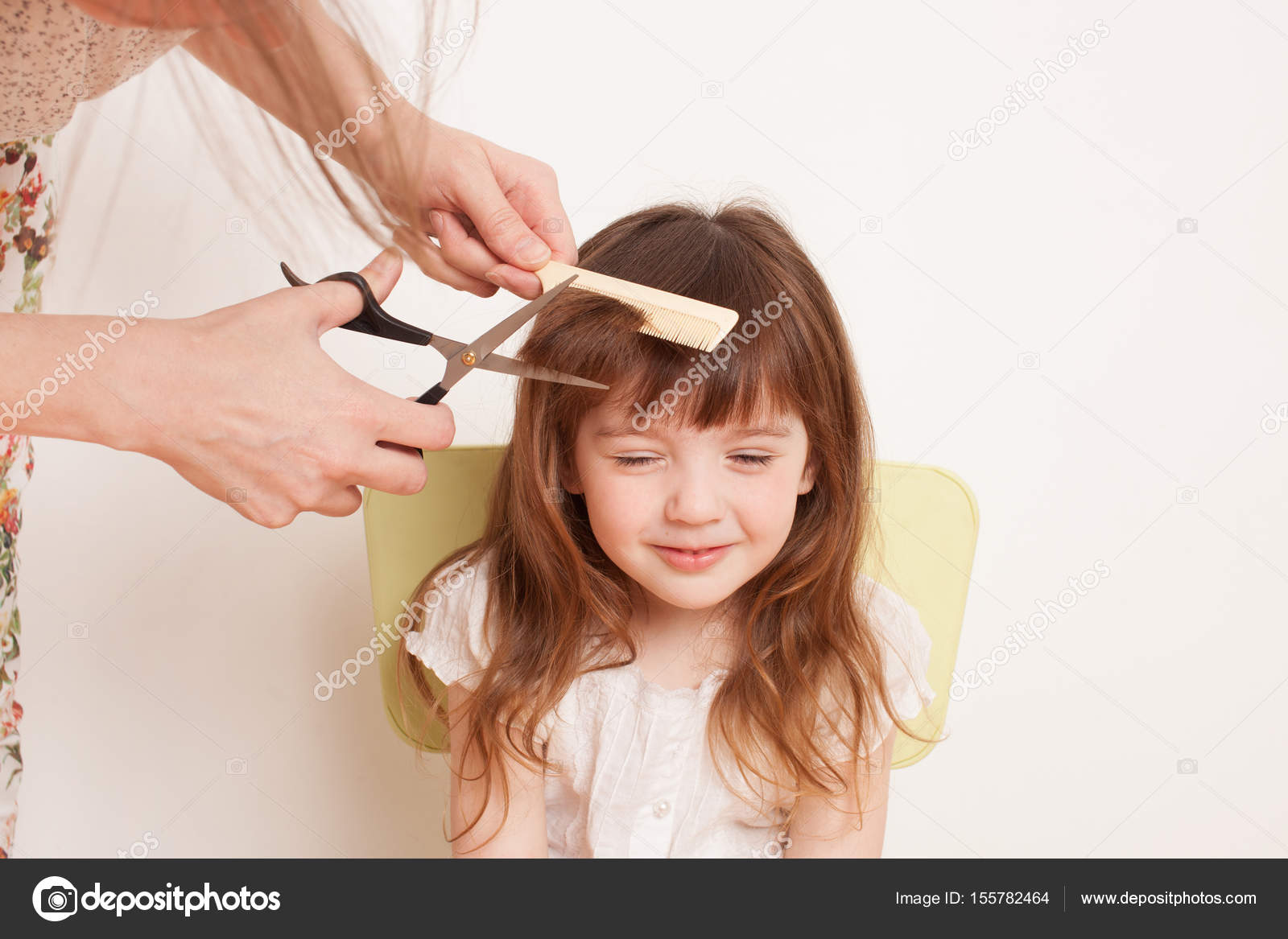 Mother cuts daughter's hair at home Stock Photo by ©ekramar 155782464 Mother cuts daughter's hair at home Stock Photo by ©ekramar 155782464