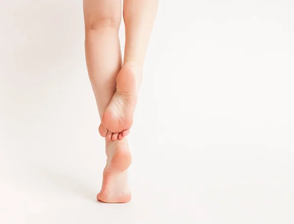 Bare feet on a white background — Stock Photo, Image