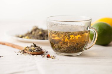 Herbal tea from medicinal herbs on a white table