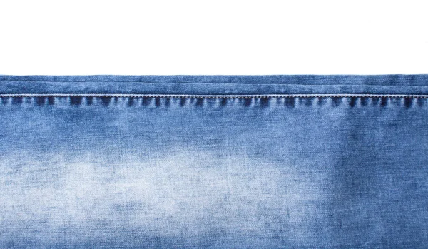 Background from pieces of jeans on white — Stock Photo, Image