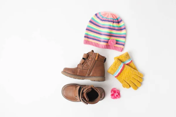 Hat, brown boots and gloves on white — Stock Photo, Image