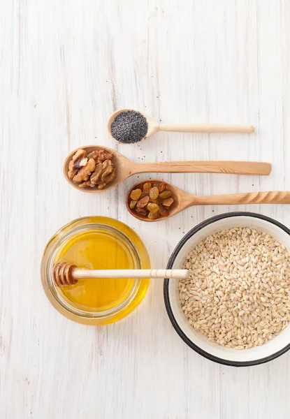 Ingredients for Christmas porridge on white table — Stock Photo, Image