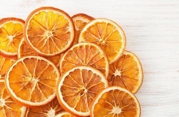 Dried oranges on white. Place for text.