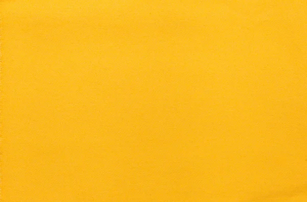 Struttura di sfondo di jeans di tessuto giallo — Foto Stock