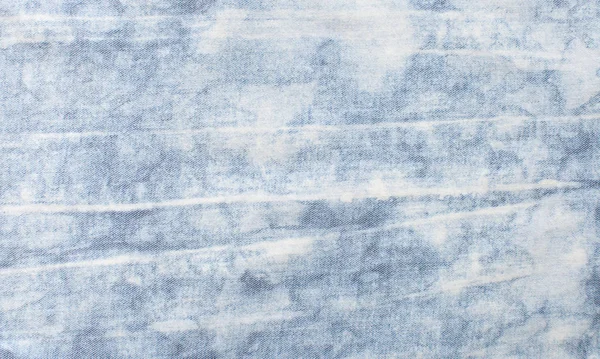 Tekstura dżinsowe ubrania wypryskami — Zdjęcie stockowe