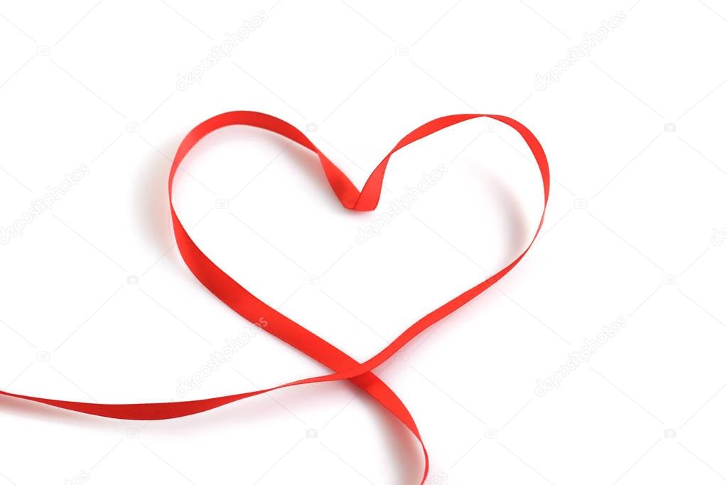 Heart from red ribbon on a white background