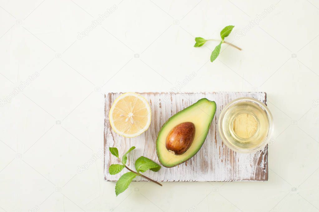 Recipes avocado with honey on white background