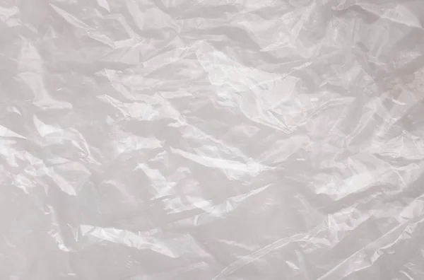 Background texture of a polyethylene transparent film on a white background — 스톡 사진