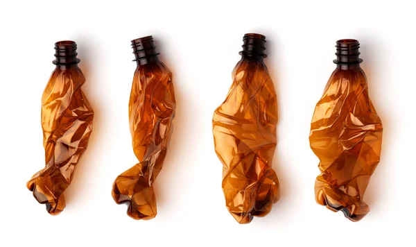 Una Botella Plástico Marrón Arrugado Con Una Sombra Sobre Fondo —  Fotos de Stock