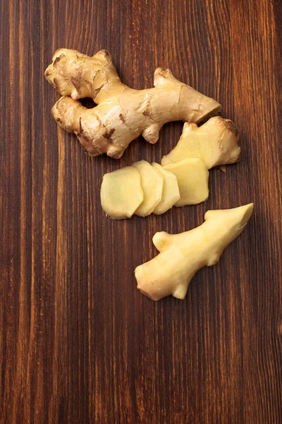 Cut and peeled young ginger root. Ginger root is used to increase immunity, to lose weight, whether it protects against colds and viruses. Top view. Space for text