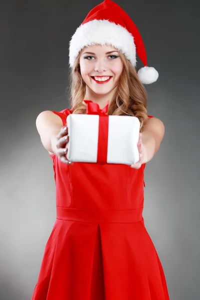 stock image Christmas isolated woman portrait hold red christmas gift.