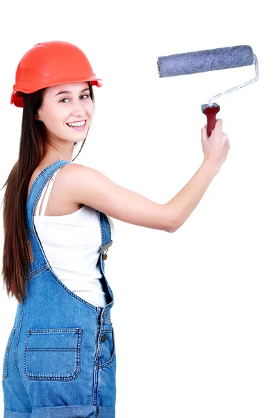 Retrato de jovem construtor do sexo feminino em macacão e capacete com rol — Fotografia de Stock