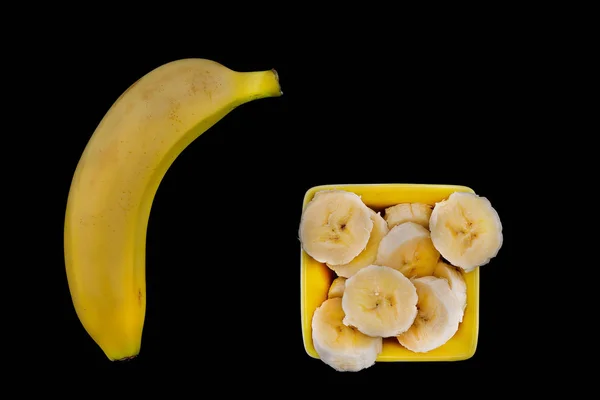 Banana with slices of banana — Stock Photo, Image