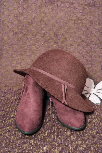 boots and red hat of woman
