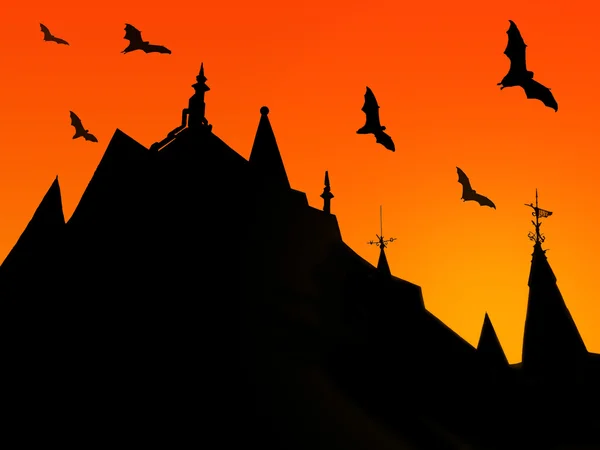 Halloween background with silhouettes of castle roofs with  weathervanes and flying bats on sunset background — Stock Photo, Image