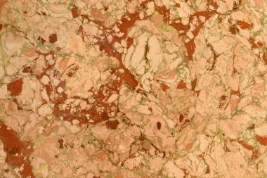 Mermer etkisi resim su, ebru denilen soyut. Karışık kırmızı, sarı ve yeşil boya. Afiş, kitap, kart, davet, doku için alışılmadık arka plan.