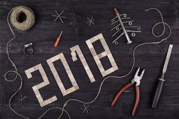 A New Year\'s card from construction objects and materials