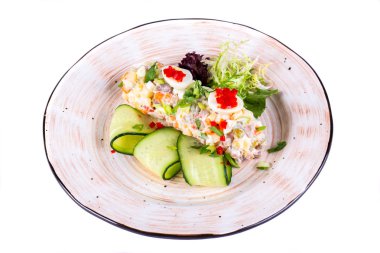 Salatalıklı Olivier salatası ve havyarlı bıldırcın yumurtası.