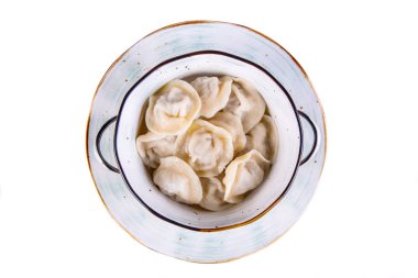 Yağlı haşlanmış hamur köftesi. Yağlı haşlanmış hamur köftesi.