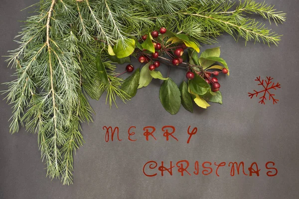 Cartão de felicitações com decoração festiva e texto - Feliz Natal — Fotografia de Stock