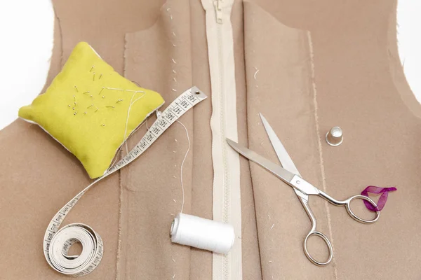 Dressmaker prepares wrap detail with sketch lines. — Stock Photo, Image