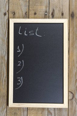 Black chalkboard with wooden frame. clipart
