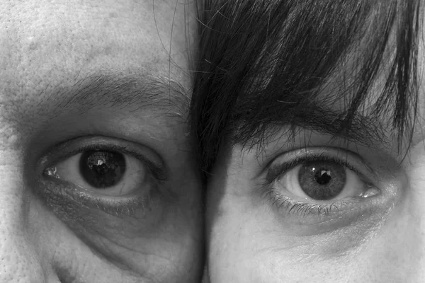 一个女人和一个男人的眼睛 — 图库照片