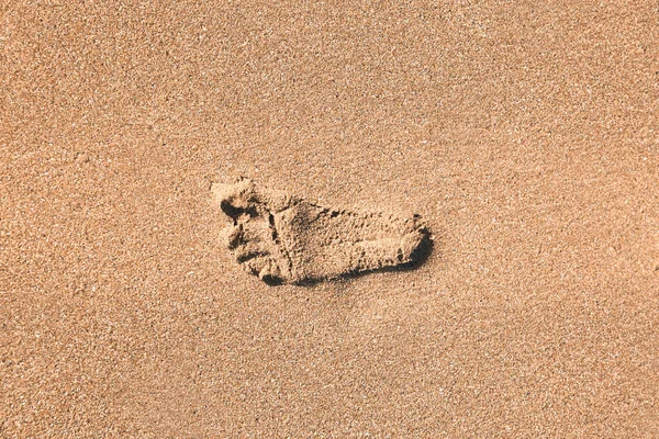 Schritte im Sand eines Strandes — Stockfoto