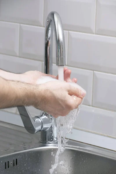 Man Washes His Hands Running Water White Wall Clean Hands — Stock Photo, Image