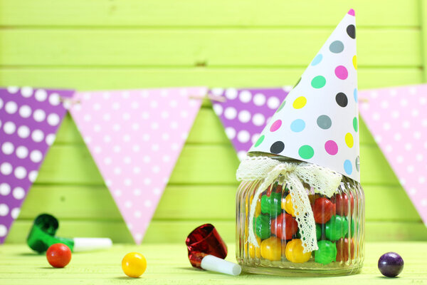 color candy in glass jar