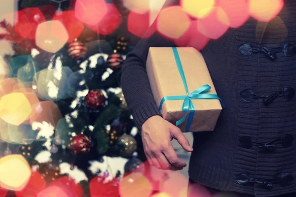 Zásobníku ruku na dárek Vánoce — Stock fotografie
