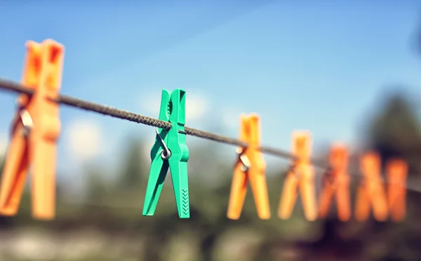 Colored clothespin on the rope outdoor — Stock Photo, Image