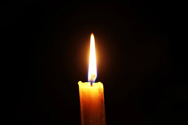 Candle flame isolated on black — Stock Photo, Image