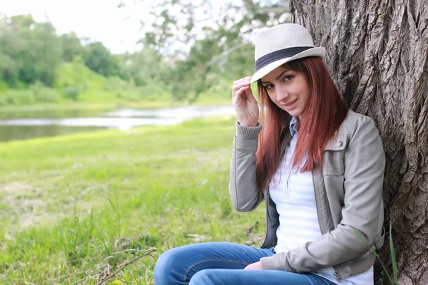 Woman in tree park outdoor Stock Image