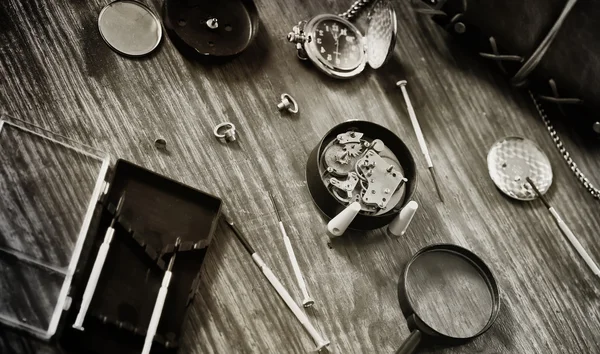 Black and white photo watch clock repairing — Stock Photo, Image