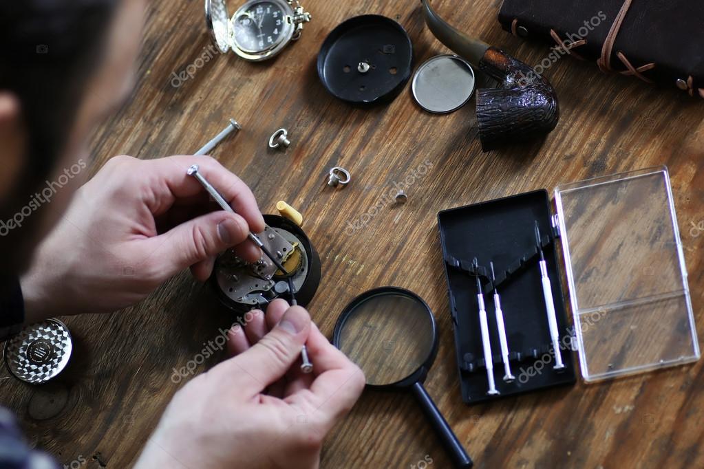Watch clock repair Stock Photo by ©alexkich 127606436