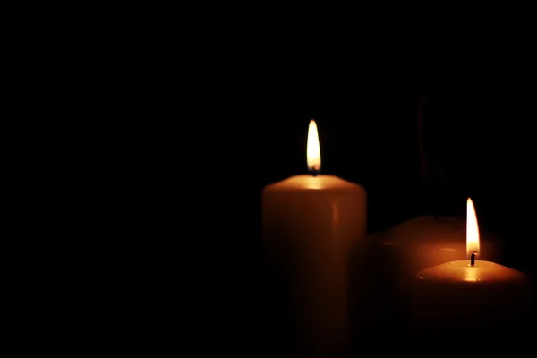Свічкове світло ізольоване чорне — стокове фото