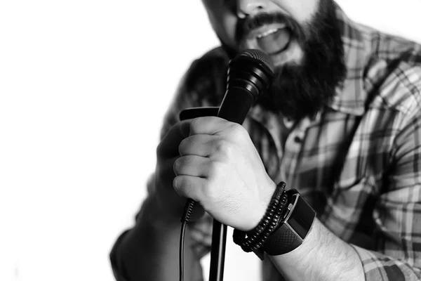Micrófono mano hombre aislado — Foto de Stock