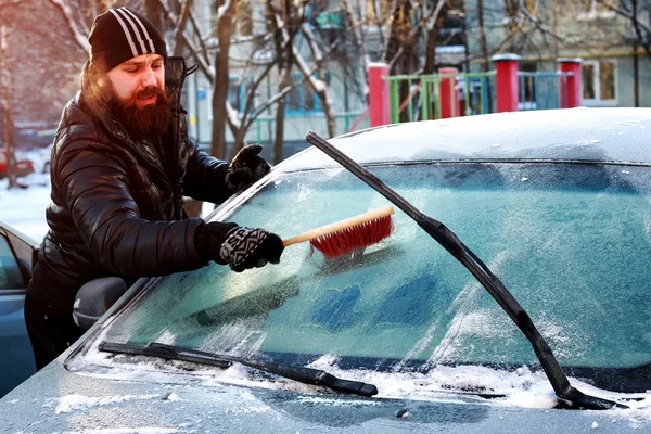 Winter man brush car snow — Stock Photo, Image