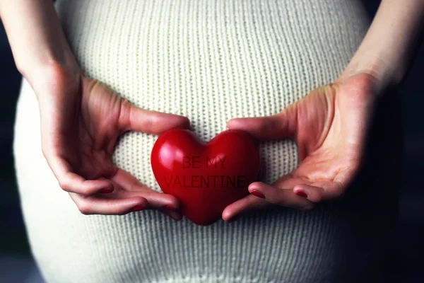 Woman holding heart — Stock Image Woman holding heart Royalty Free Stock Photos
