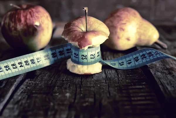 Anorexia thinness measuring apple — Stock Photo, Image