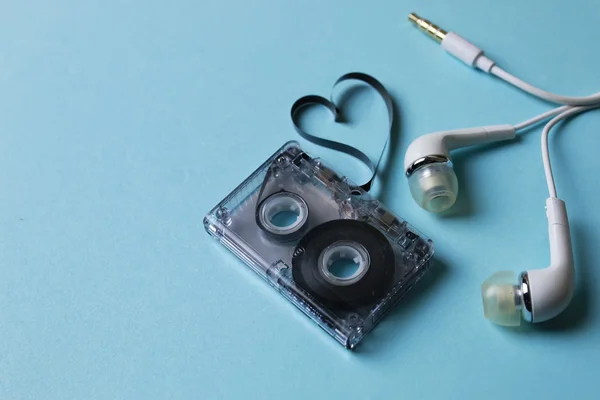 Audio tape on a blue background — Stock Photo, Image