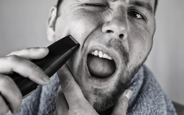 Monochrome textured portrait bearded man shaving — Stock Photo, Image