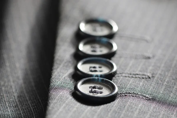 Полоса костюма кнопки — стоковое фото